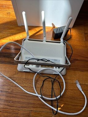 TP-Link White Wireless Router with Three External Antennas and Ethernet Ports